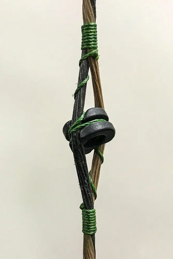 a properly tied in peep sight on a compound bow setup