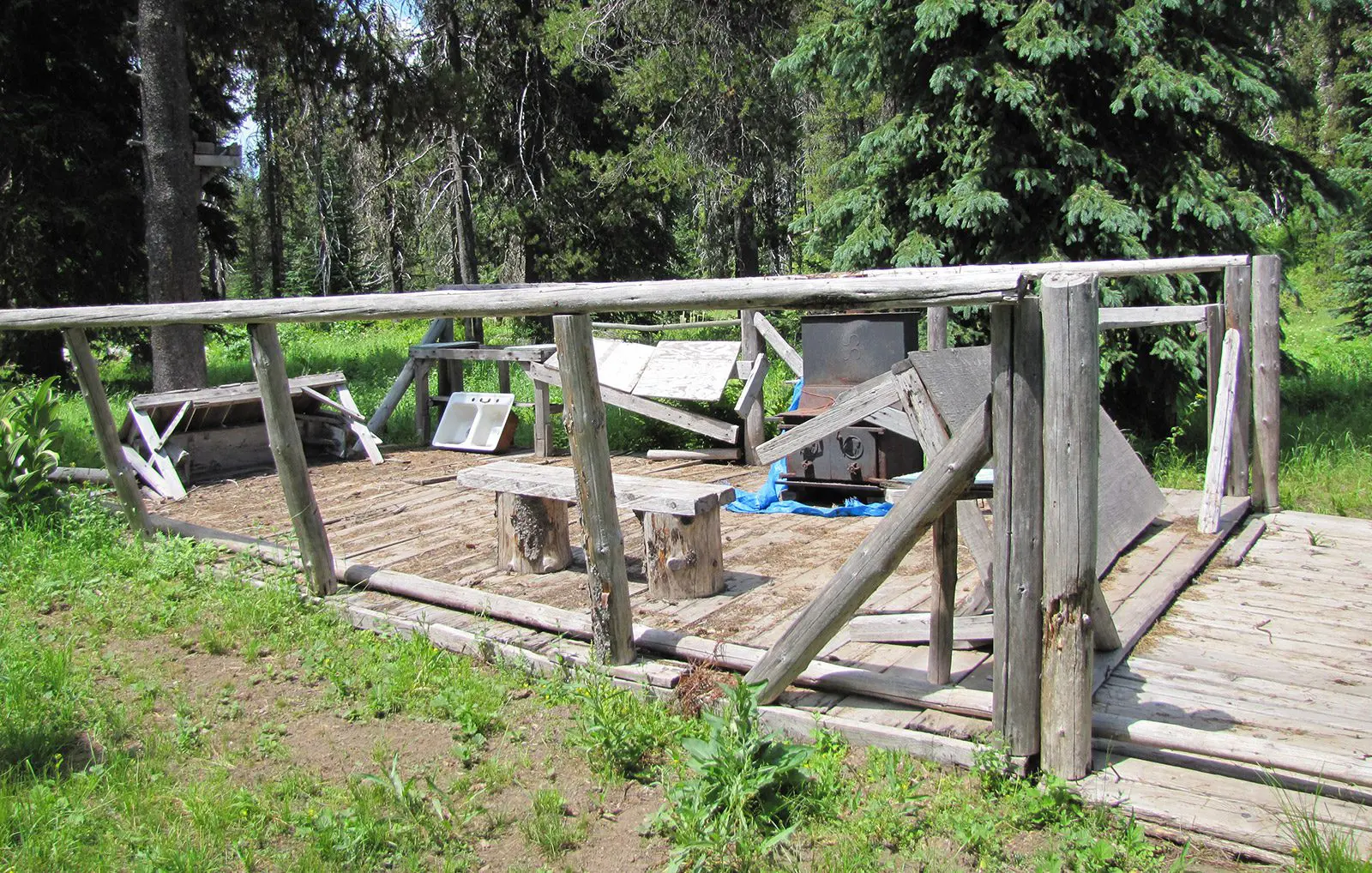 An outfitter camp with a big heavy hunting stove