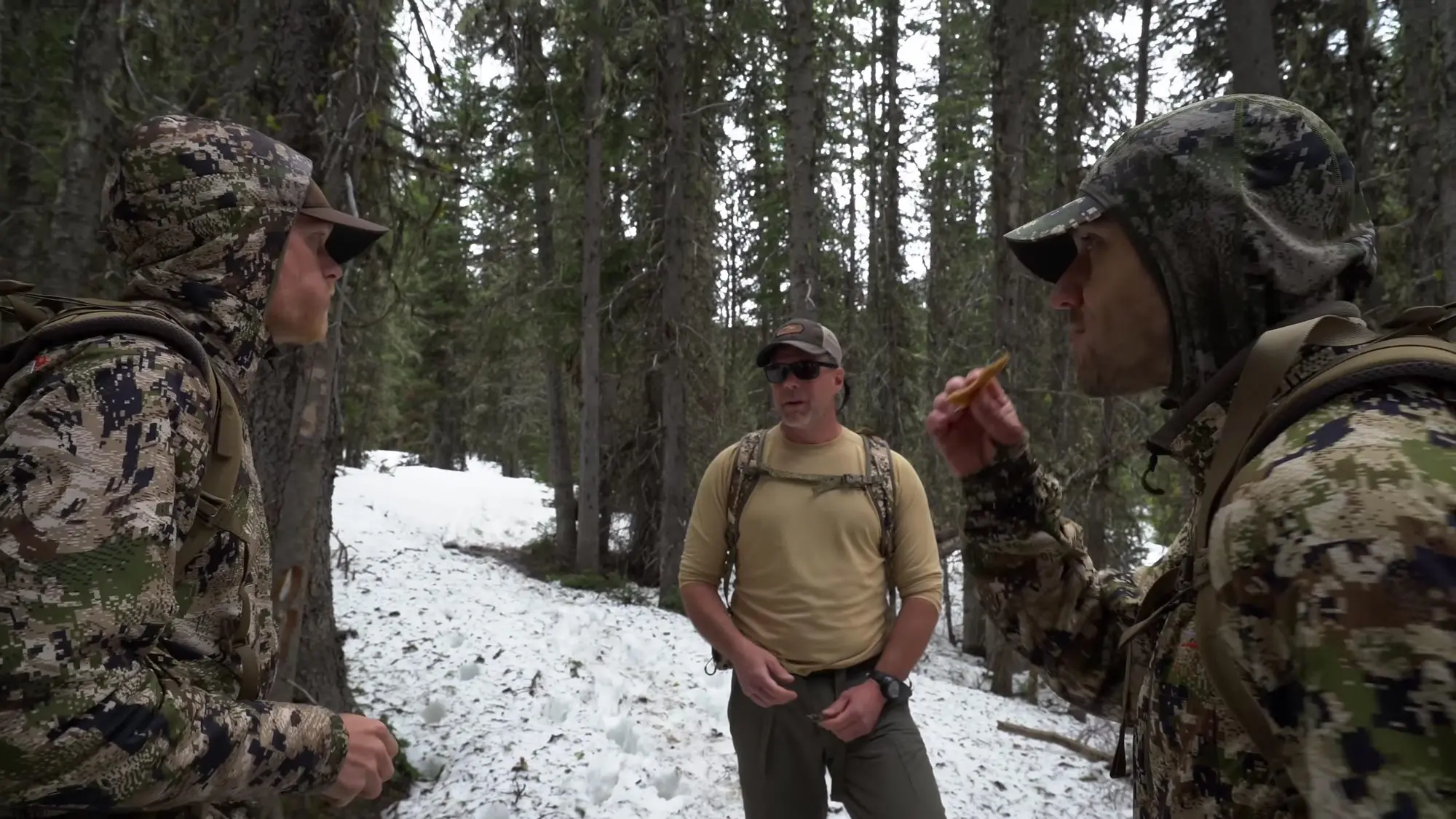 The JOMH crew eating to help rewarm after the drill.