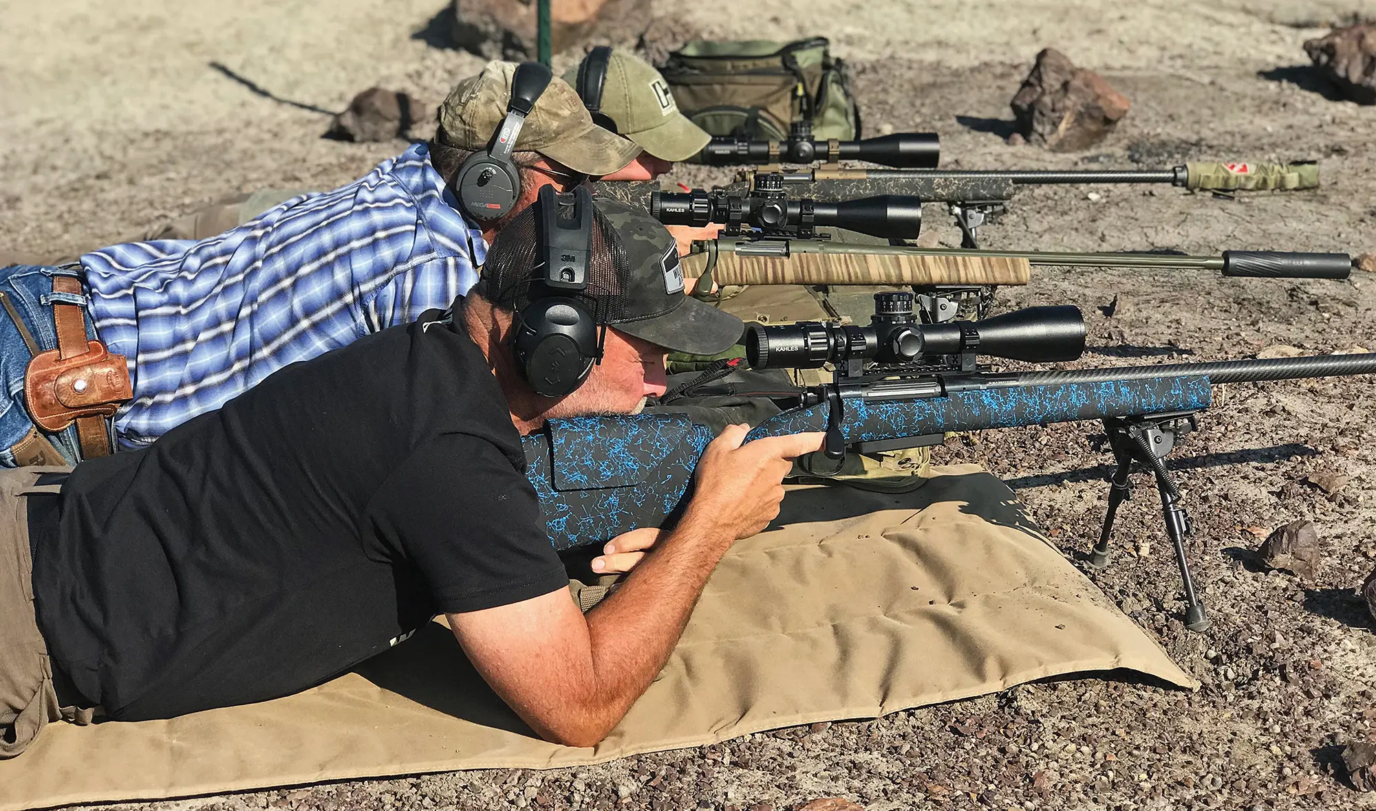 Chris and Colton running the PLC rifles through the paces on steel targets in the Wyoming wind and heat.