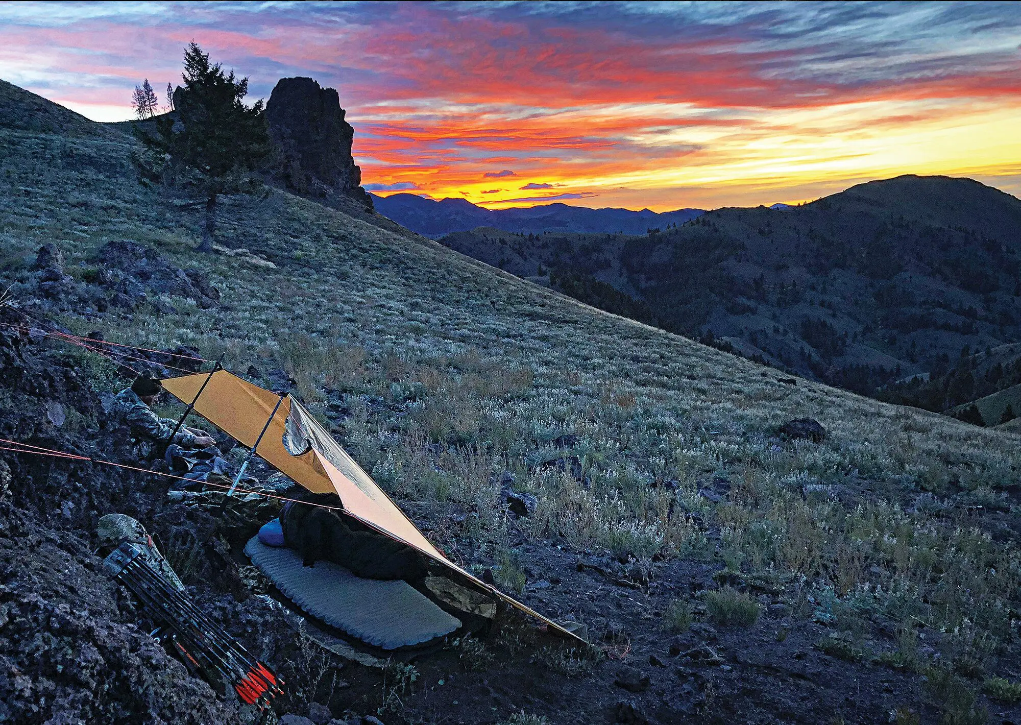 My typical early season backpack-hunt shelter is a barebones bivy tarp.