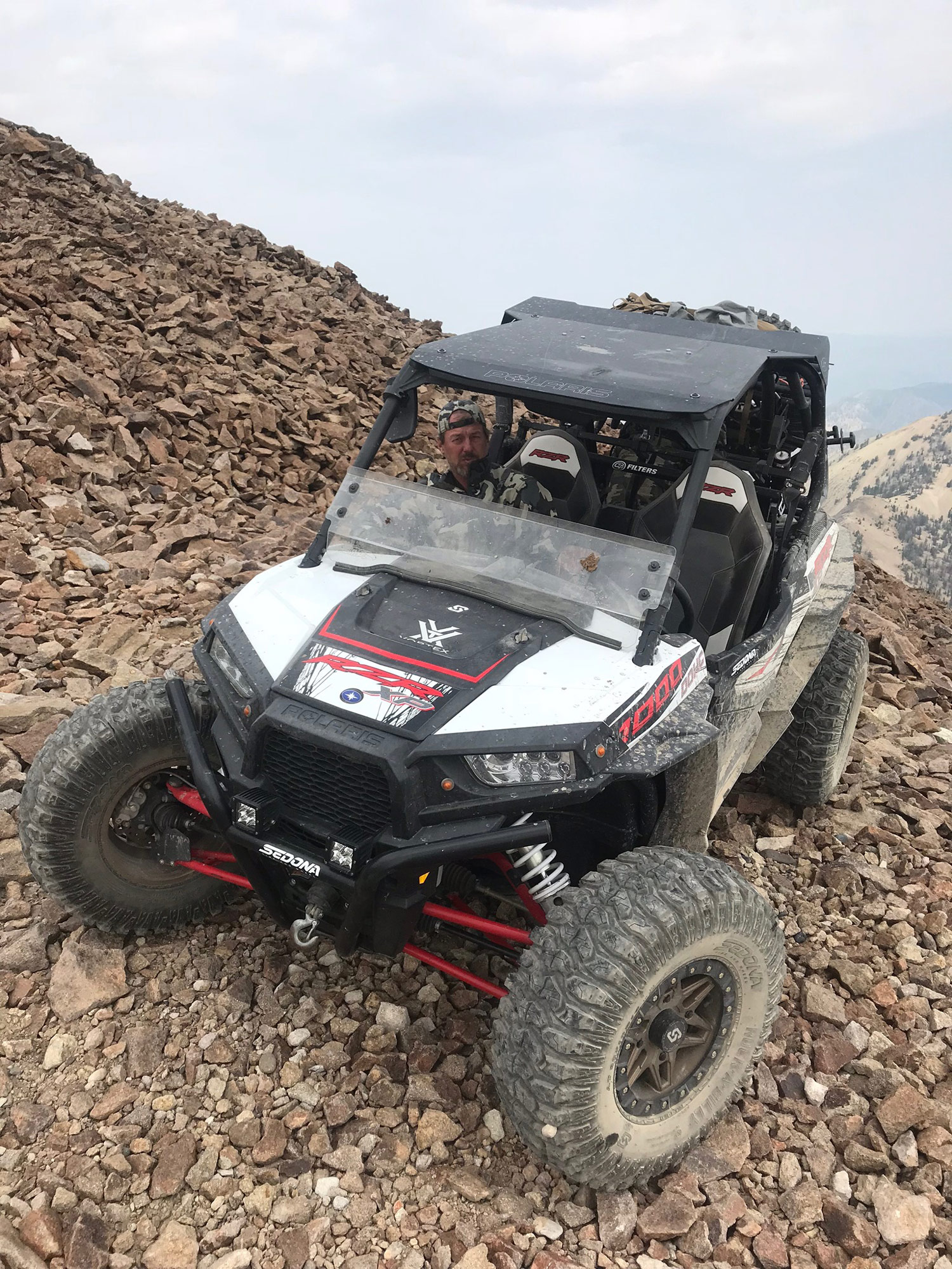Driving a hunting UTV through the mountains