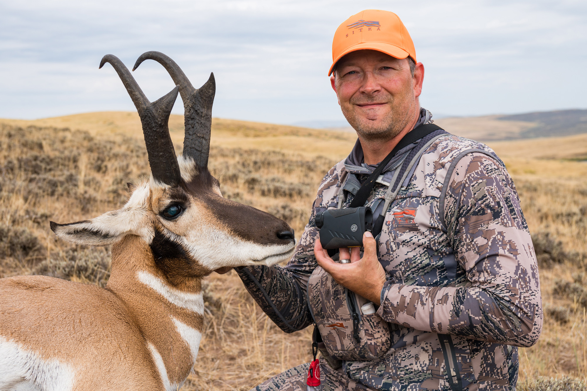 Darrin Cooper posing with his Sig Sauer BDX Rangefinder and Antelope