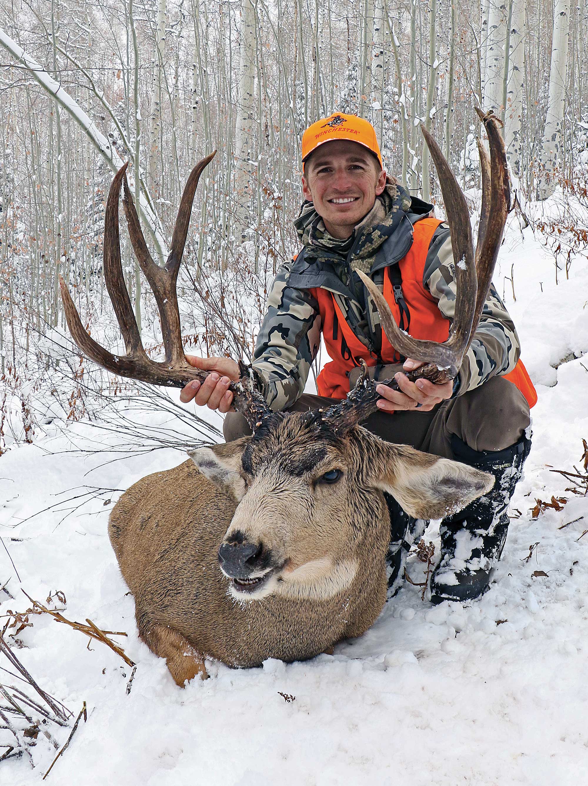 Josh Schulgen with a nice mule deer buck