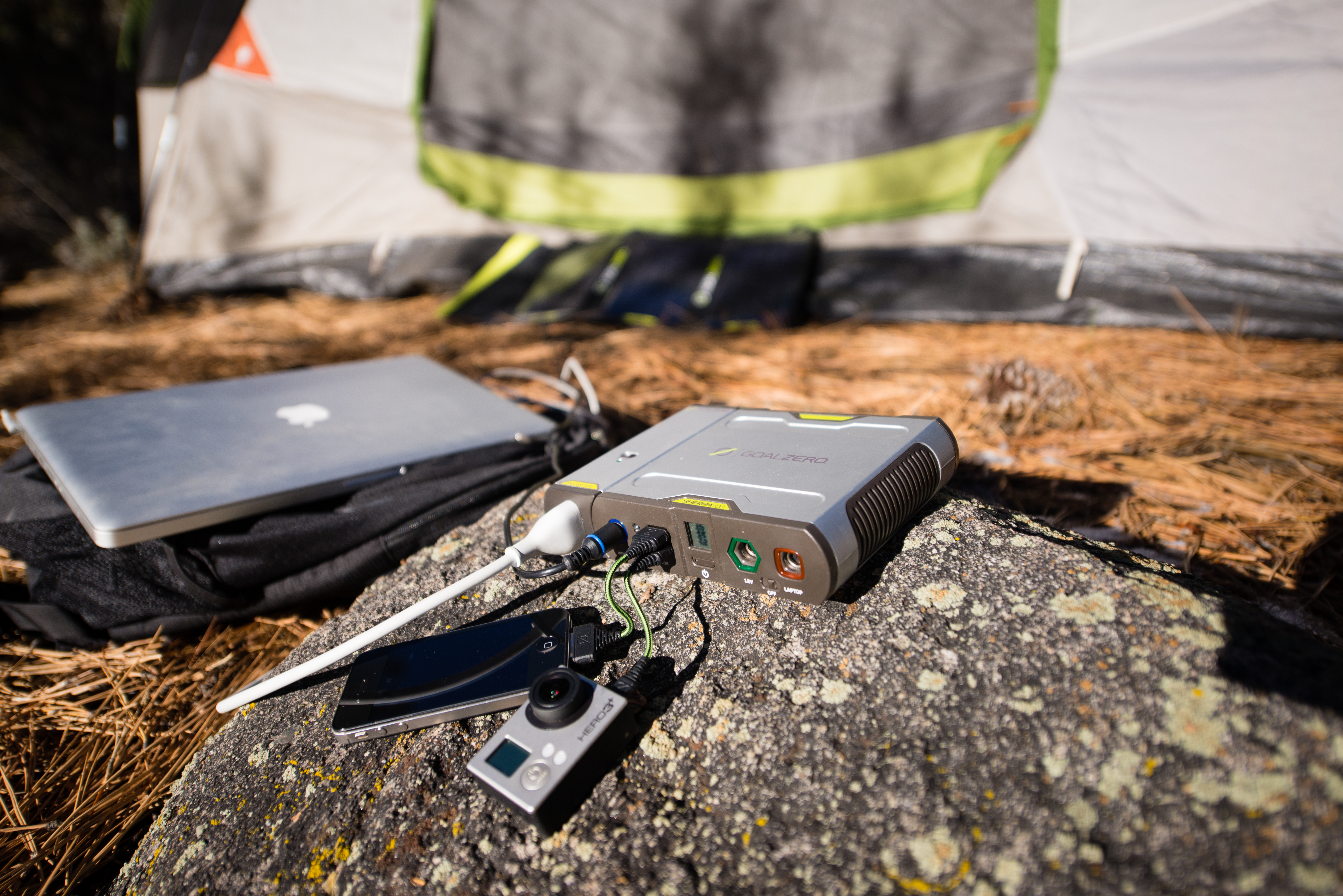 A Sherpa portable power sources charging multiple devices.