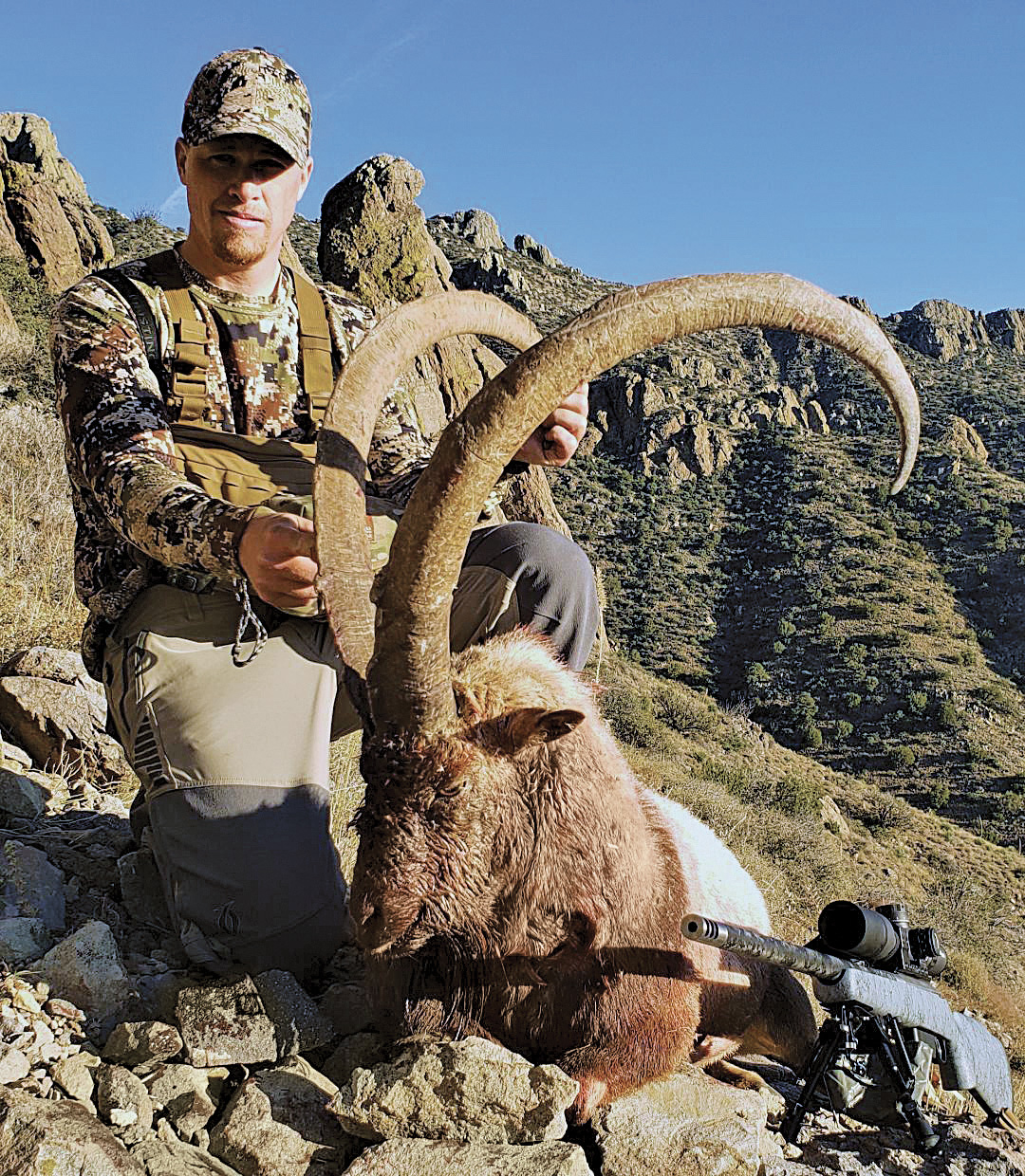 Jesse Greer with a great New Mexico Ibex from a previous exotic hunt.