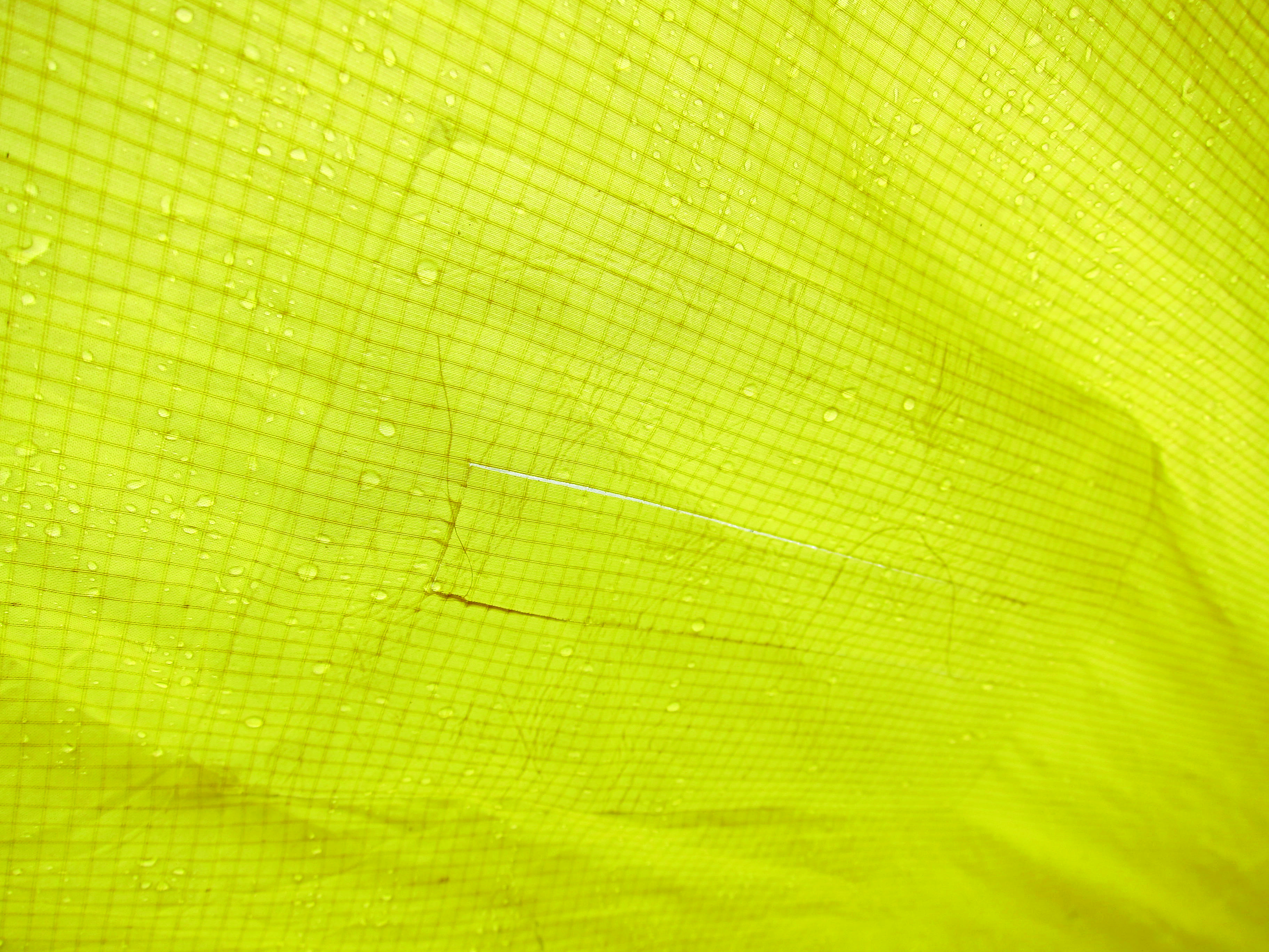 a repair on a tent using tenacious tape