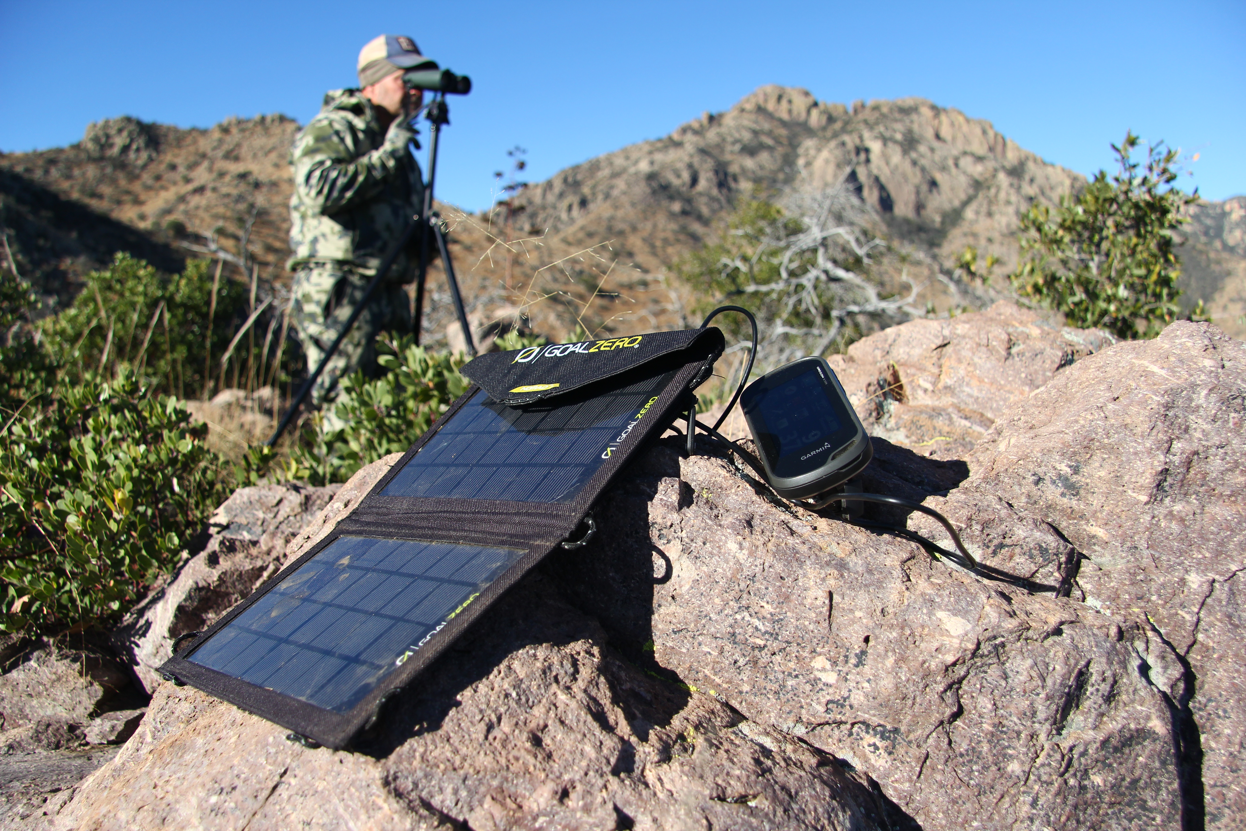 a Goal Zero solar portable power source charging a phone