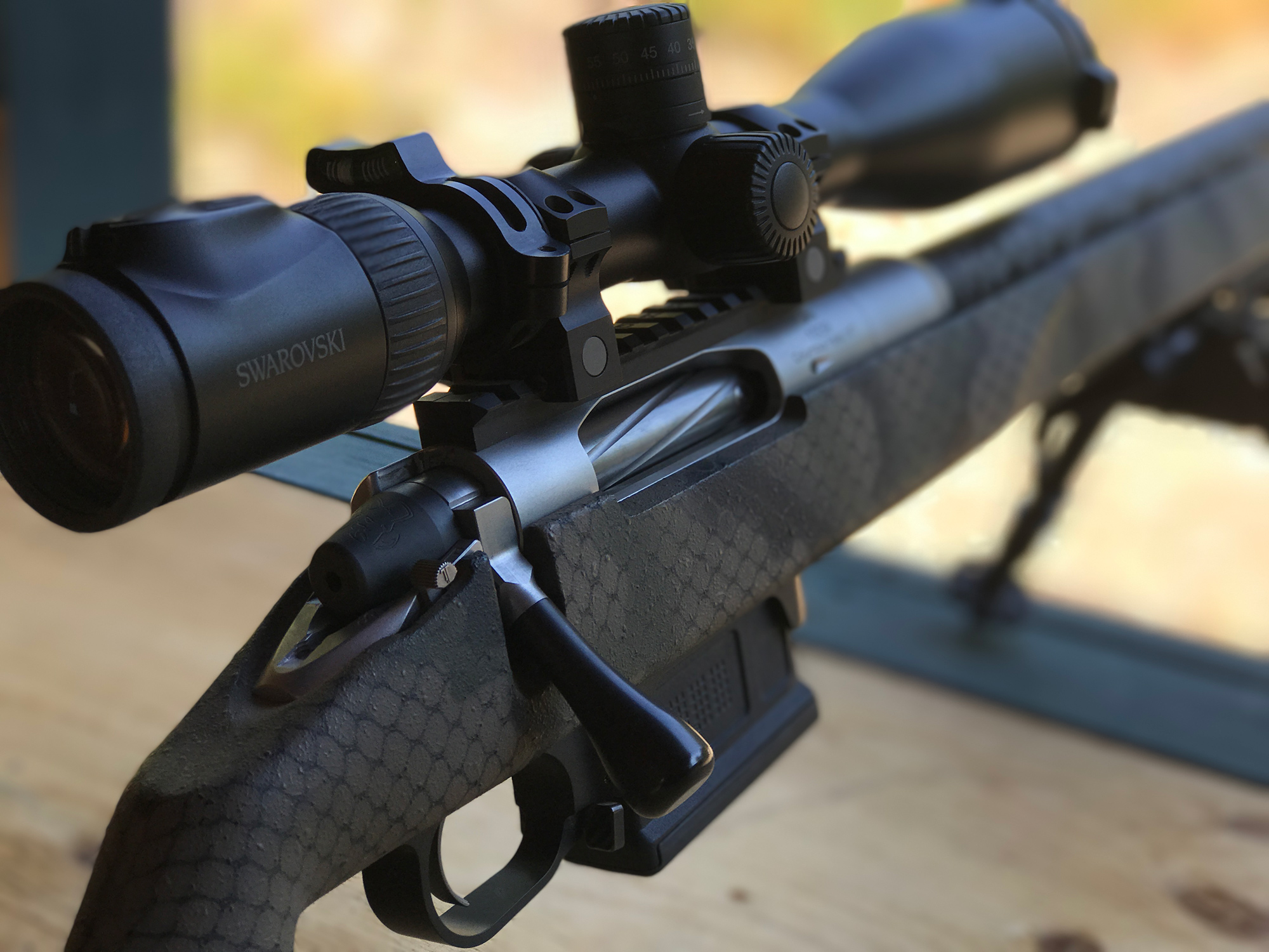 a Swarovski riflescope mounted to a Proof Research Switch rifle.