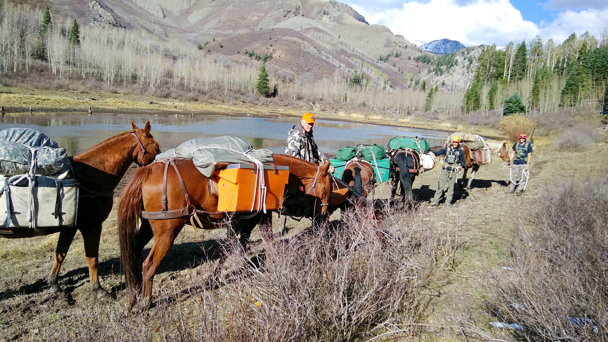 horseback hunting in the mountains