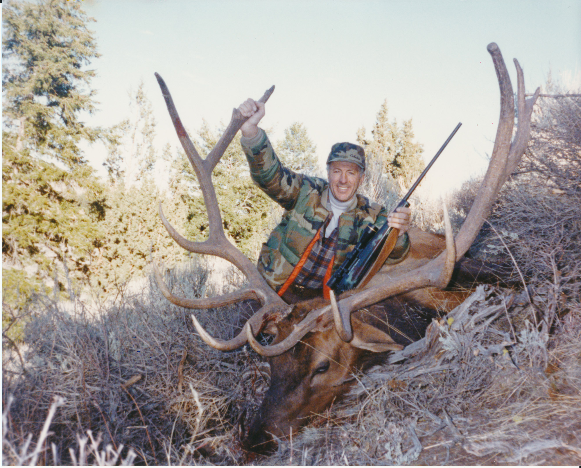 George Bettas with a stud bull elk